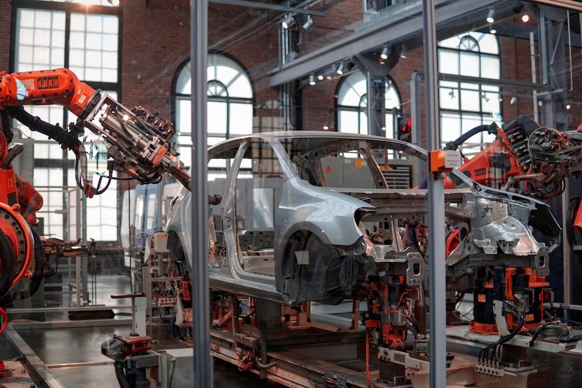 Robotic automation cells operating inside a smart factory hall