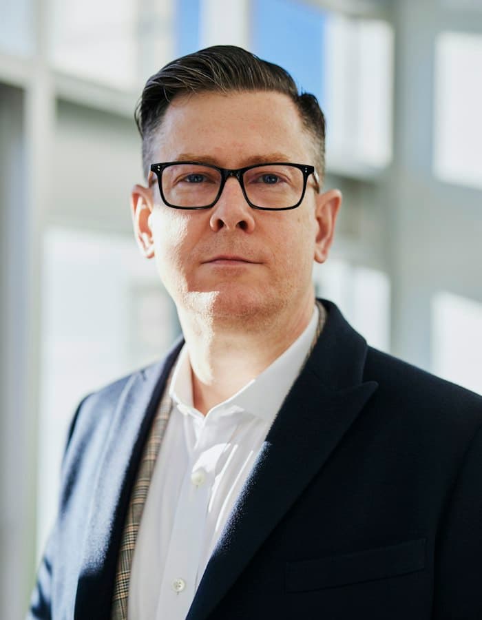 Portrait of Michael Brennan, Founder and Managing Director